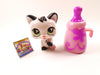 Littlest Pet Shop Magic Motion cat #493 with a bottle