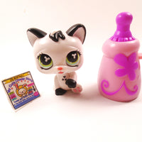 Littlest Pet Shop Magic Motion cat #493 with a bottle