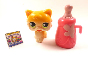 Littlest Pet Shop Magic Motion cat with a bottle